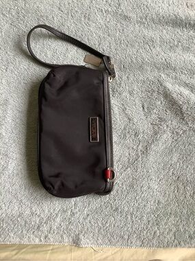 Tumi Black Nylon Wristlet with Red Accent